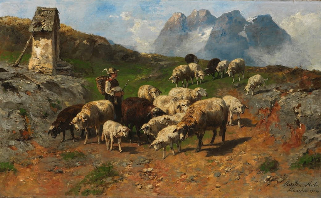 山上带着羊的年轻牧羊人
