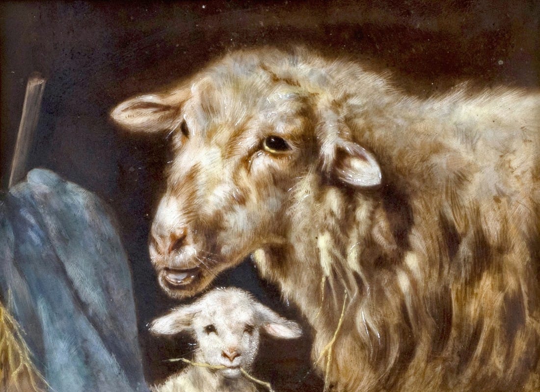Mutterschaf mit Lamm im Stall