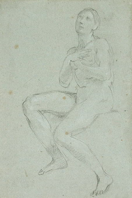 交叉双臂坐着的裸体女人