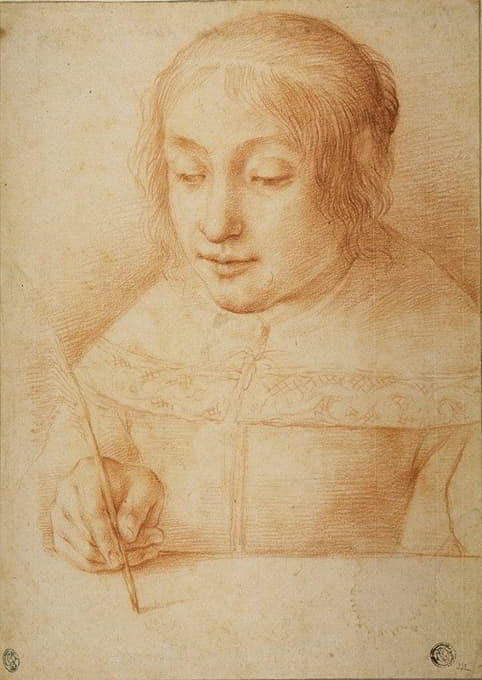写作或绘画的年轻女子