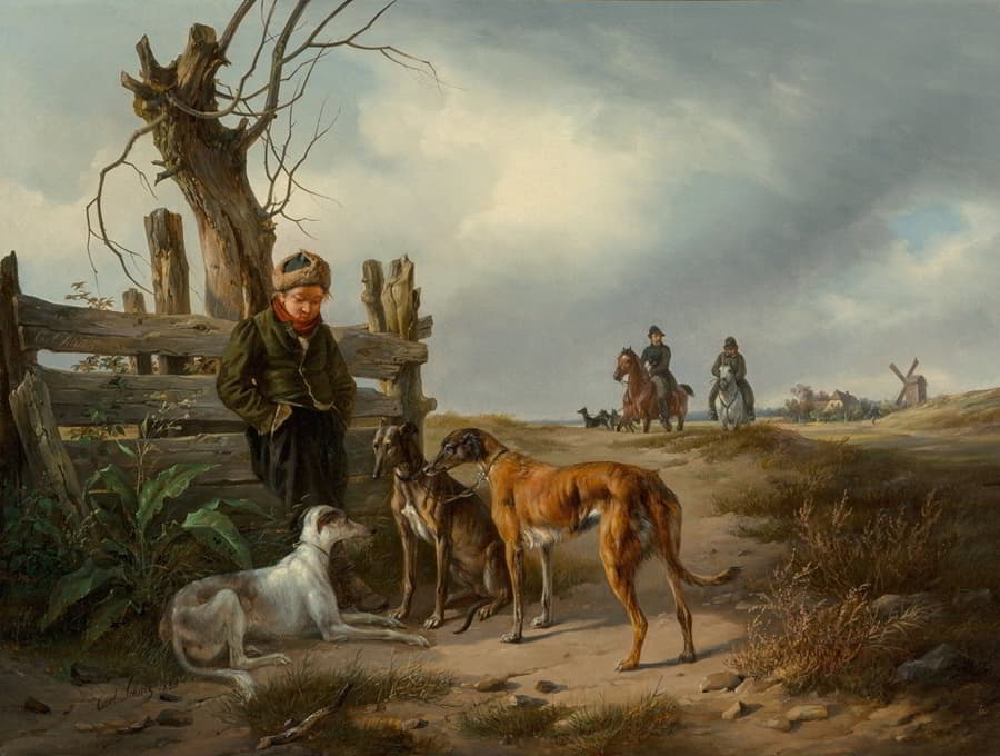 一个小男孩和猎狗在栅栏旁休息