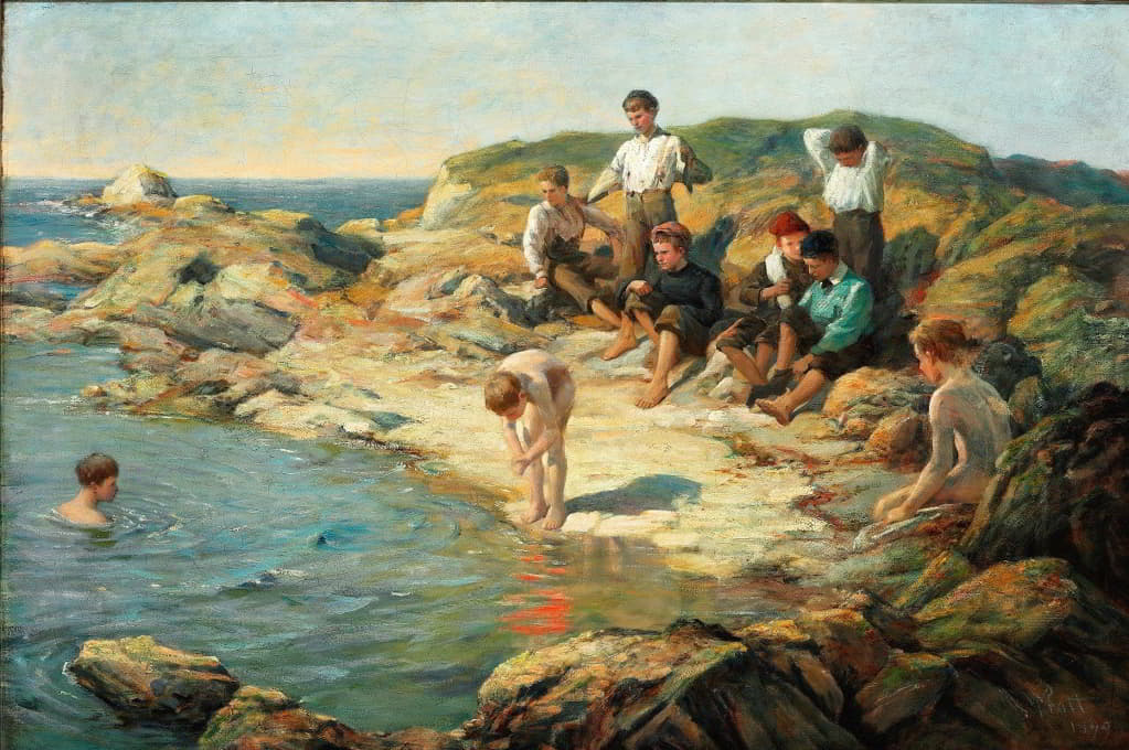 男孩们在岩石海岸游泳