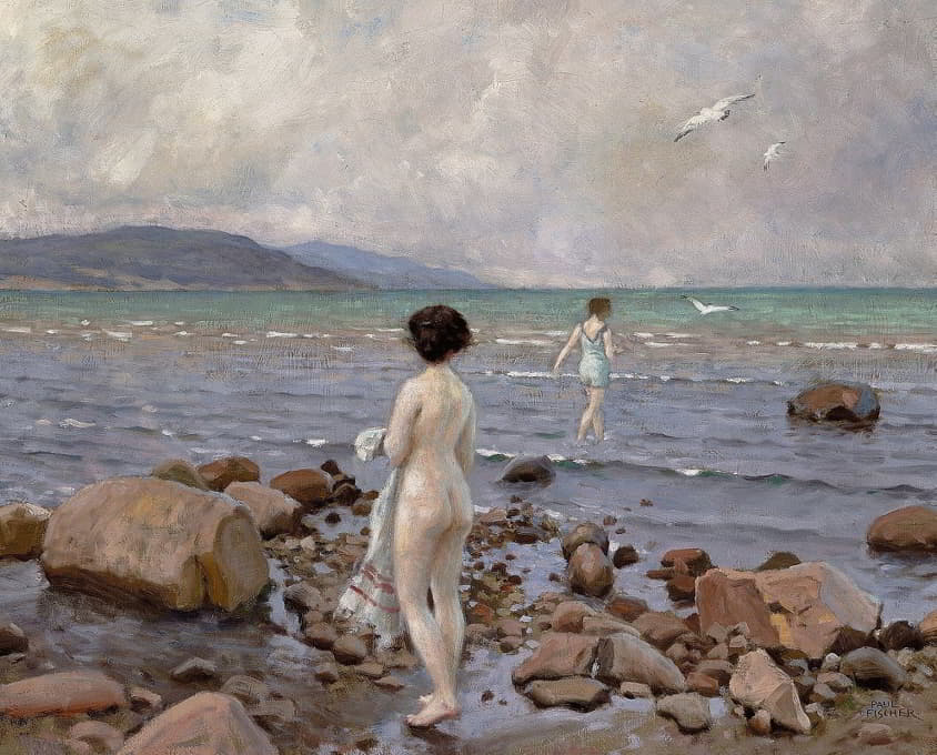 两个在石头海滩上洗澡的女孩