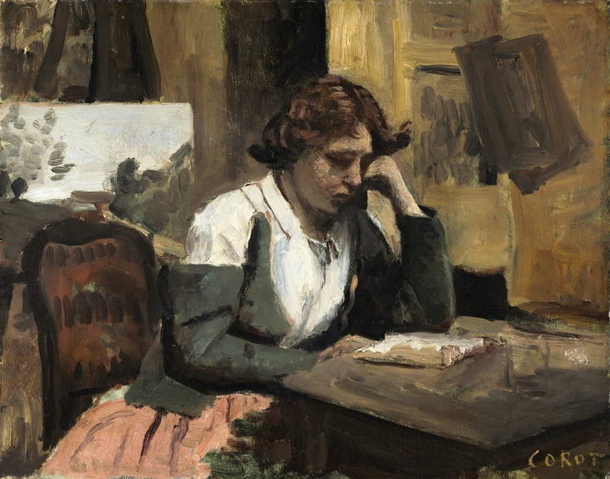 在画室里读书的女人