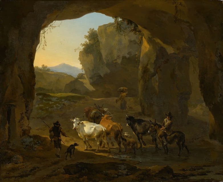 在山洞里养牛的农民