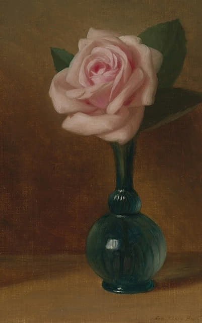 绿色花瓶里的粉红玫瑰
