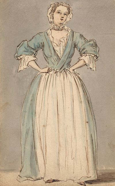 一个穿着蓝色连衣裙的年轻女人