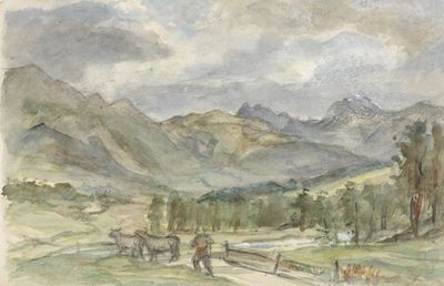 牧牛人和两头奶牛的山地景观