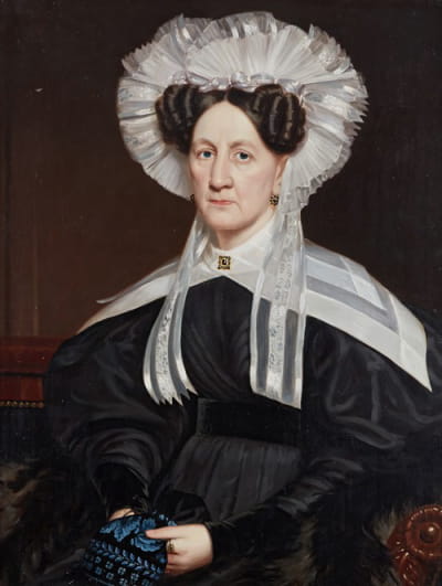 一位戴蕾丝帽的女士的肖像，据说是船长的妻子