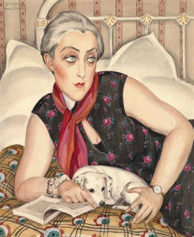 一个女人和狗一起读书的肖像