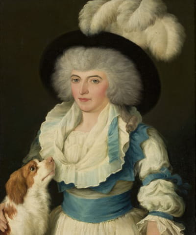 一个戴着鸵鸟羽毛帽子的女人和一条狗的肖像