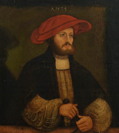窗台前一位戴红帽子的绅士的肖像