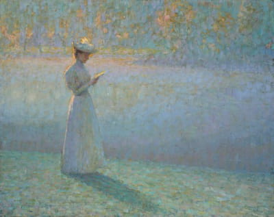 在风景中读书的女人