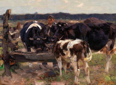 一只牧羊人和奶牛在水边