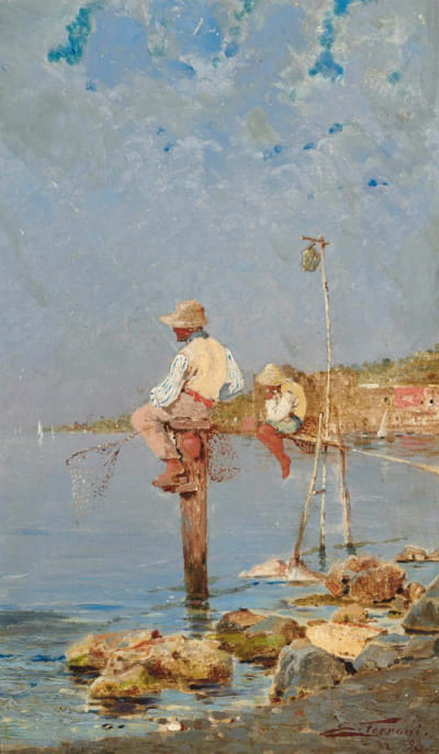 在意大利海岸钓鱼的男孩