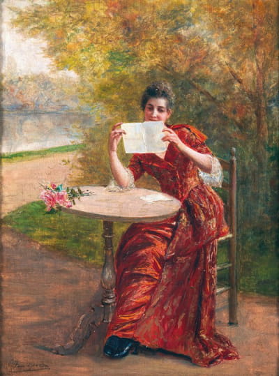 一个女孩在公园里读一封信
